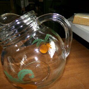 vintage glass orange juice pitcher.